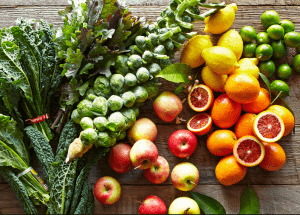 a group of fruits and vegetables on a wood surface Healthy Weight Loss Diets Kings Hill